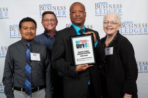 UICCU Staff Holding Best Places to Work Award